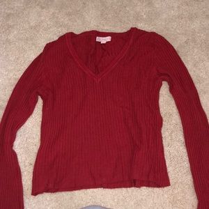 red v-neck sweater
